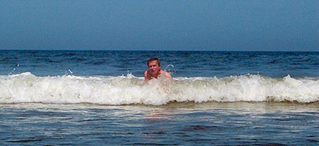 Dr. Kreeft body-surfing.  Photo courtesy of Rev. Chuck Alley.